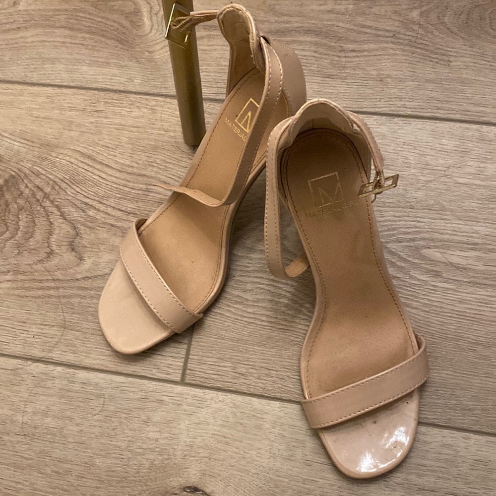 Taupe strap heel,barely worn no scuffs,3 1/2 inch.paten leather